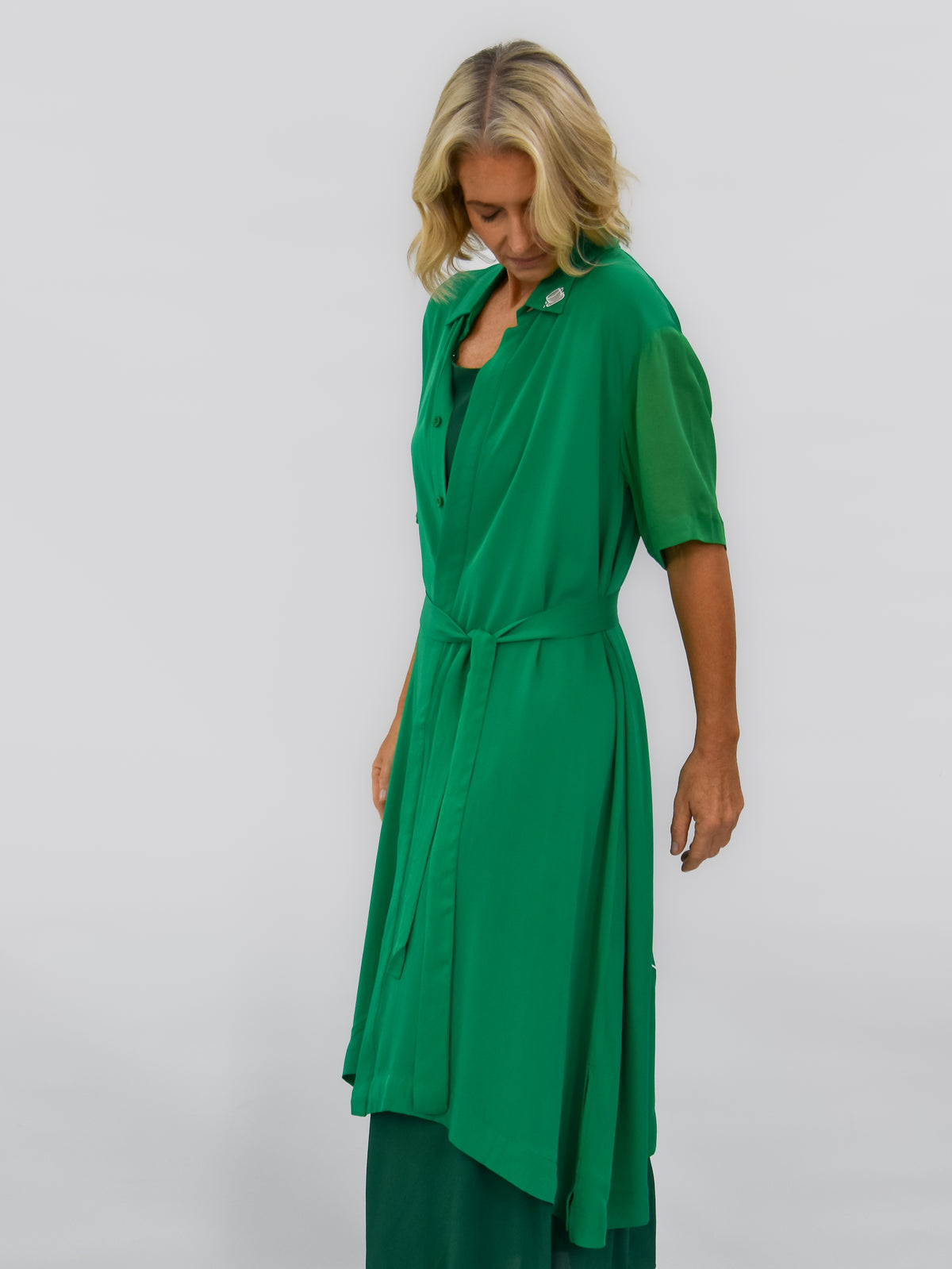 Green short sleeve dress tied at waist - front view 