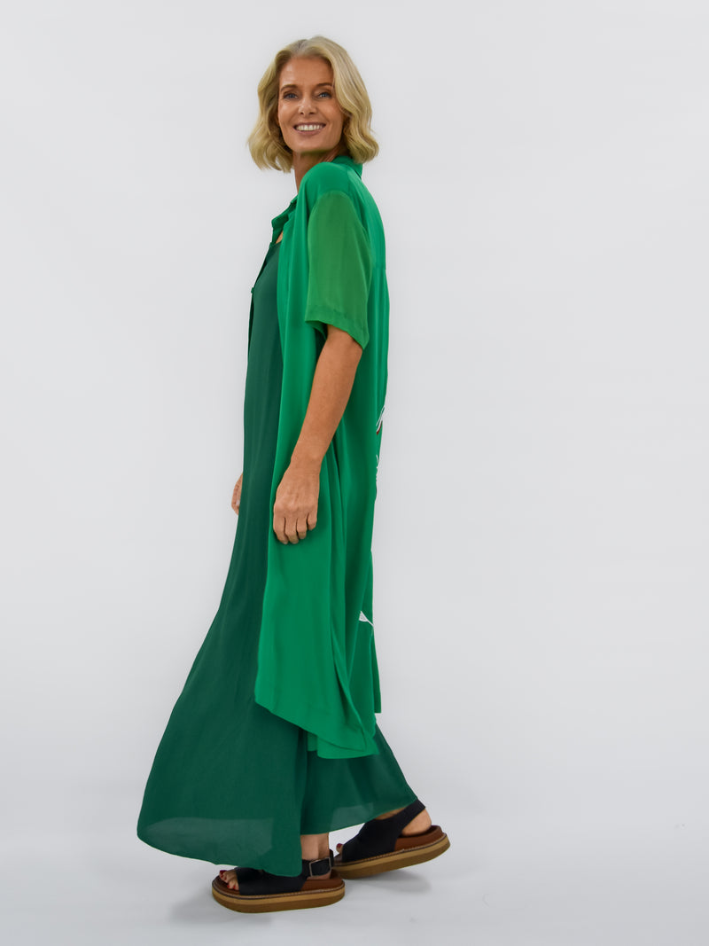 Green Short sleeve dress over green slip dress